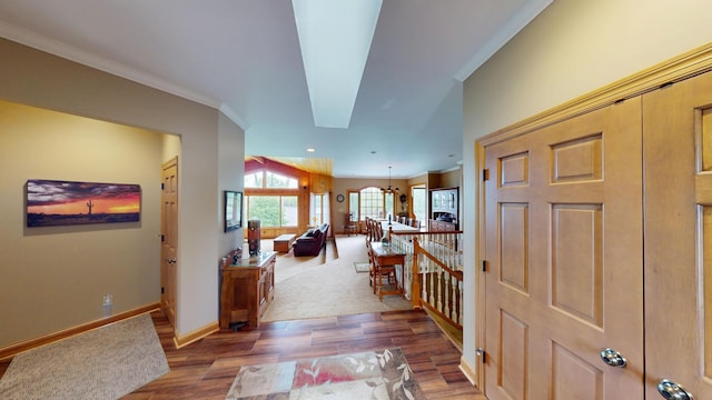 2704 Campus Ln, Albert Lea, MN 56007 - foyer featuring wood finished floors, baseboards, ornamental molding, and a chandelier