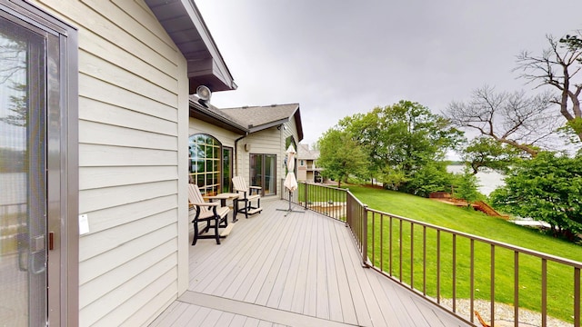 2704 Campus Ln, Albert Lea, MN 56007 - wooden terrace with a lawn