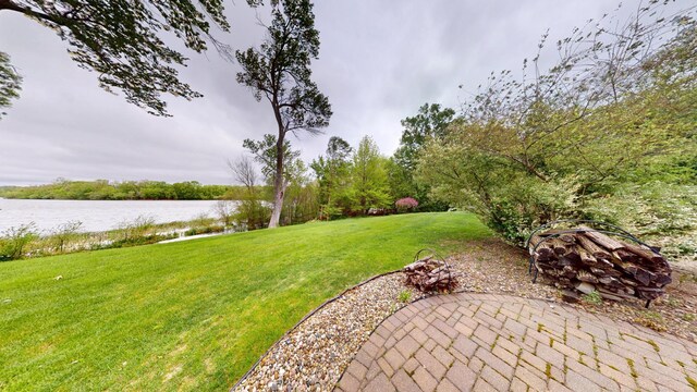 2704 Campus Ln, Albert Lea, MN 56007 - view of green lawn featuring a water view and a patio area