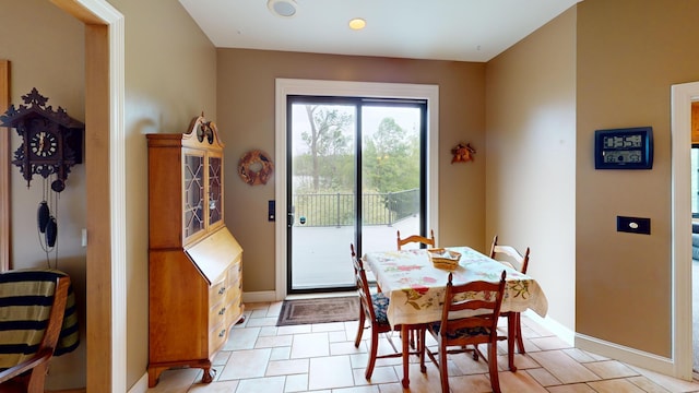 2704 Campus Ln, Albert Lea, MN 56007 - dining area featuring baseboards