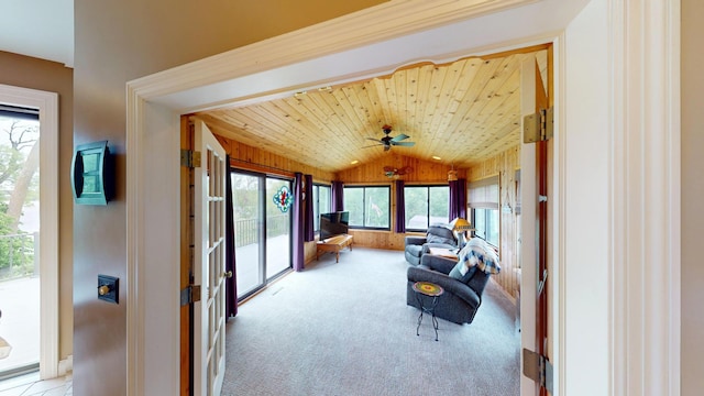 2704 Campus Ln, Albert Lea, MN 56007 - living area featuring lofted ceiling, light colored carpet, a ceiling fan, baseboards, and wood ceiling