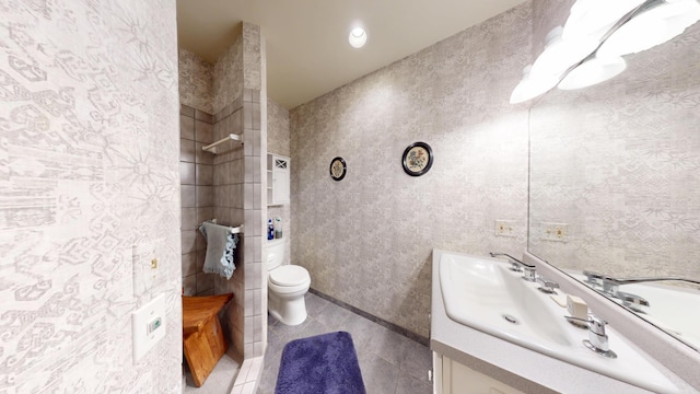 2704 Campus Ln, Albert Lea, MN 56007 - bathroom with vanity, toilet, and tile patterned flooring