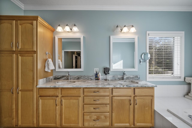 bathroom with a sink, crown molding, tiled tub, and double vanity