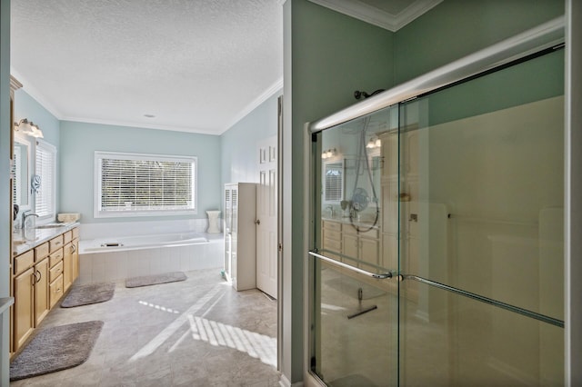 full bath featuring a shower stall, ornamental molding, a garden tub, and vanity