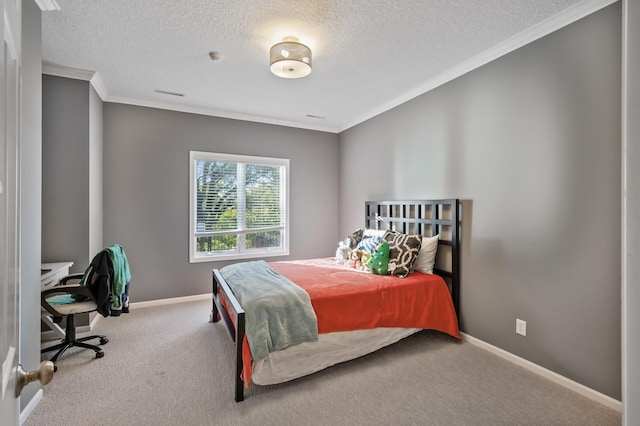 bedroom with carpet flooring, ornamental molding, a textured ceiling, and baseboards
