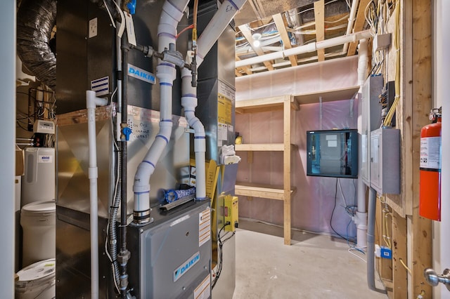 utility room with heating unit