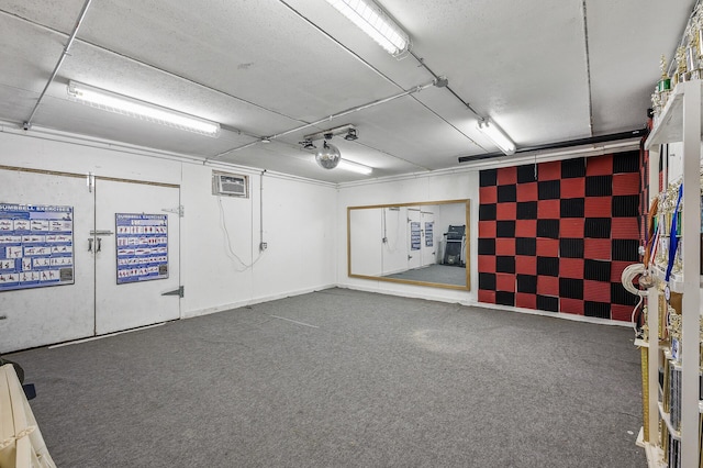 garage with a wall mounted AC