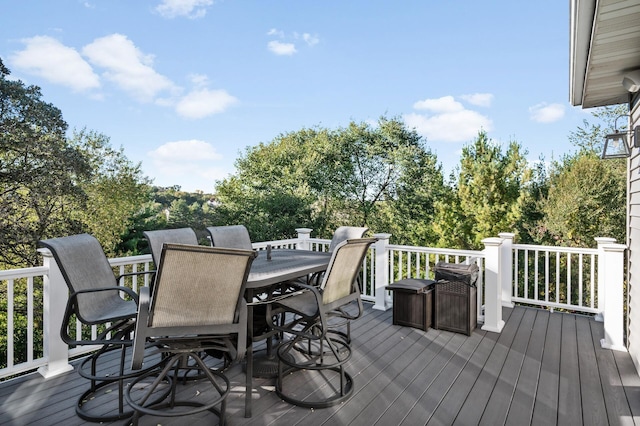 deck with outdoor dining space