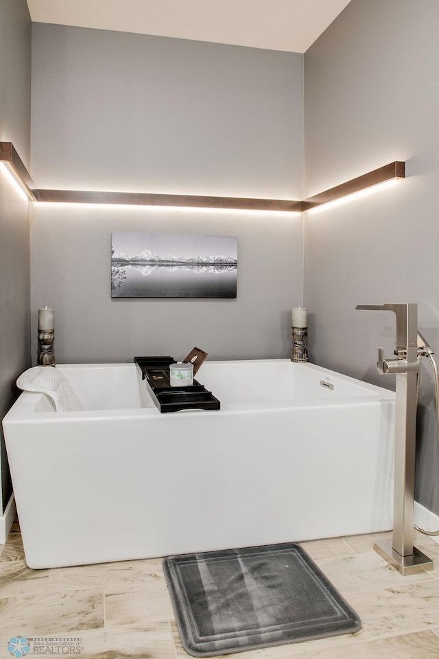 full bathroom with a soaking tub