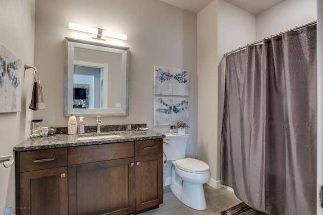 bathroom with curtained shower, tile patterned flooring, toilet, and vanity