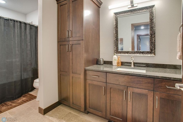 full bath with vanity, toilet, a shower with curtain, and tile patterned flooring