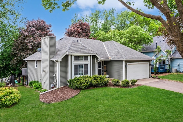 95 Olympic Cir, Chanhassen, MN 55317 - ranch-style house with an attached garage, concrete driveway, a front lawn, a chimney, and roof with shingles