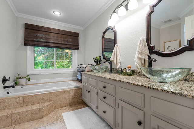 95 Olympic Cir, Chanhassen, MN 55317 - bathroom with tile patterned flooring, crown molding, a garden tub, and double vanity