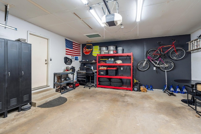95 Olympic Cir, Chanhassen, MN 55317 - garage featuring a garage door opener