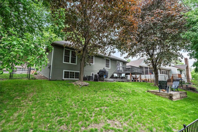95 Olympic Cir, Chanhassen, MN 55317 - back of property featuring a deck, a gate, and central air condition unit