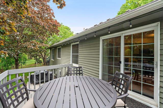 95 Olympic Cir, Chanhassen, MN 55317 - deck with outdoor dining area