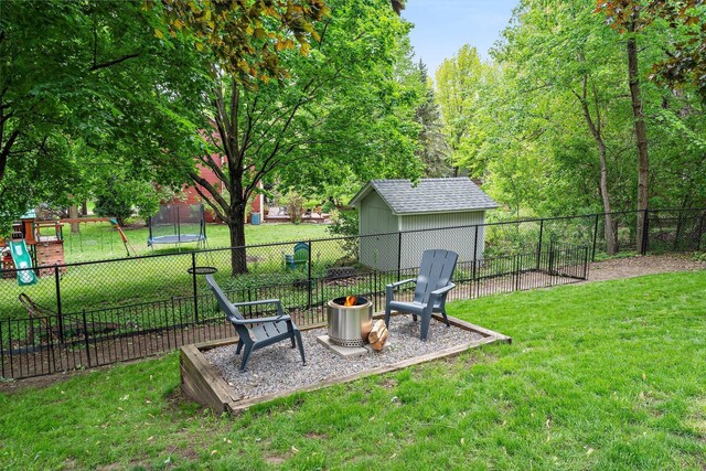 95 Olympic Cir, Chanhassen, MN 55317 - view of yard featuring a trampoline and a playground