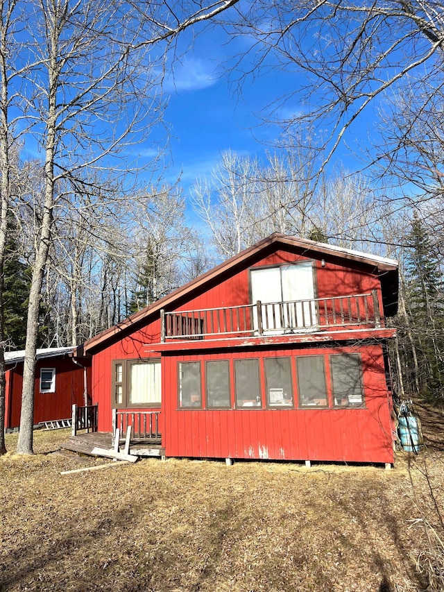 17353 Pine Dr NW, Angle Inlet, MN 56711 - view of property exterior with a balcony