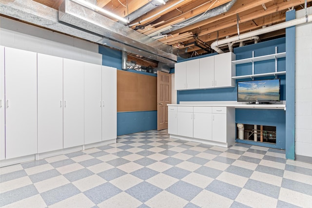unfinished basement with light floors