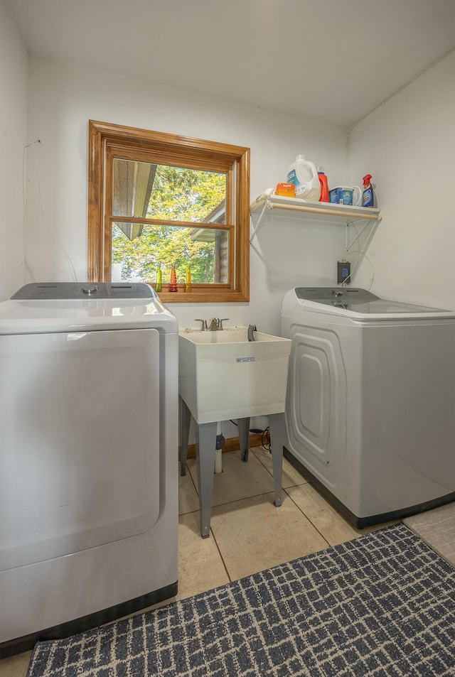 4224 Thunder Lake Lodge Dr NE, Remer, MN 56672 - laundry room featuring separate washer and dryer and light tile patterned flooring