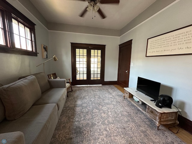 911 8th St N, Fargo, ND 58102 - living room with ceiling fan, baseboards, and french doors