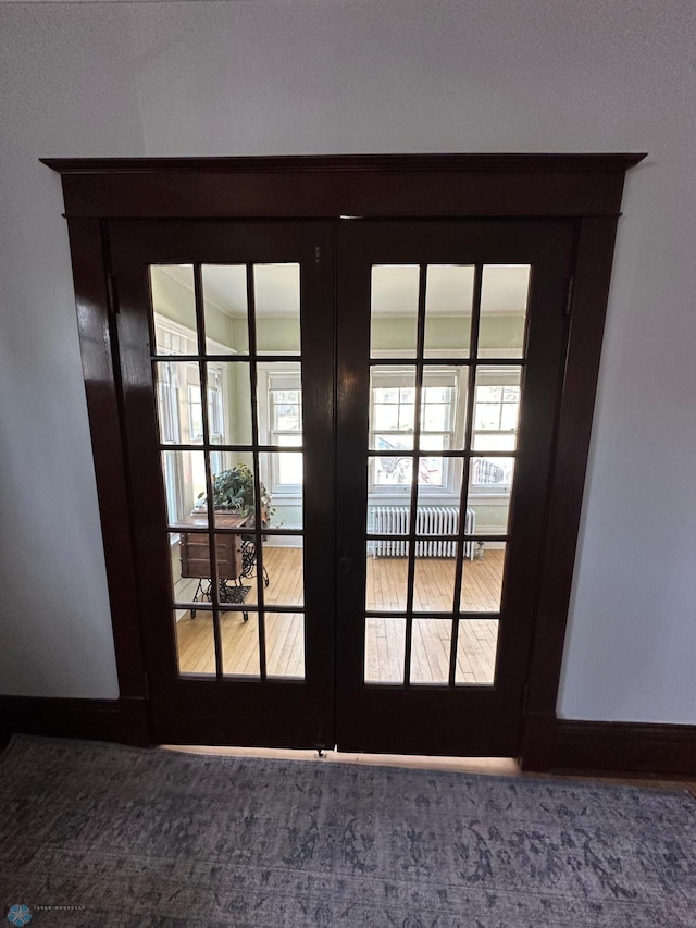 911 8th St N, Fargo, ND 58102 - doorway to outside with french doors