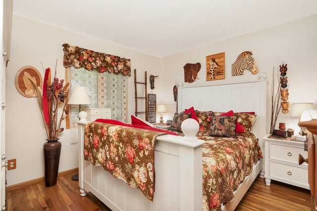11438 Zea St NW, Coon Rapids, MN 55433 - bedroom featuring wood finished floors and baseboards