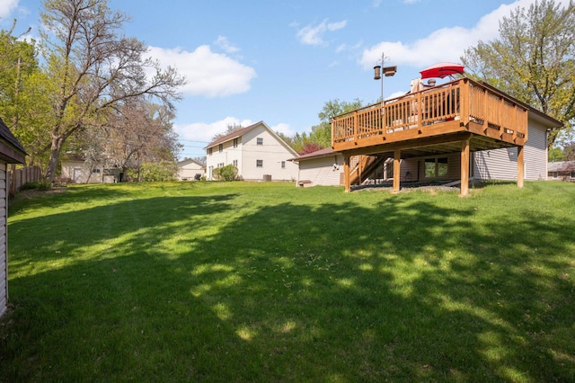 11438 Zea St NW, Coon Rapids, MN 55433 - view of grassy yard with a deck and stairway