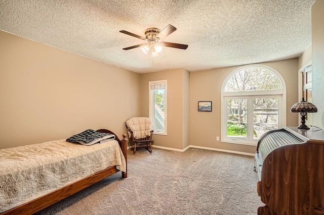 1237 Summit Oaks Dr, Burnsville, MN 55337 - bedroom with carpet, a textured ceiling, and a ceiling fan