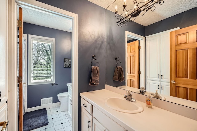 1237 Summit Oaks Dr, Burnsville, MN 55337 - bathroom with a chandelier, vanity, and a textured ceiling