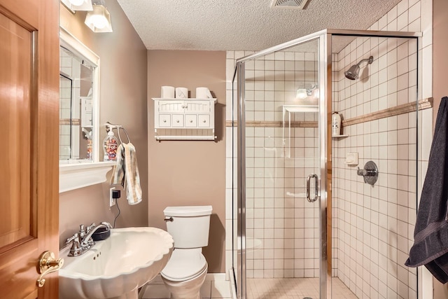 1237 Summit Oaks Dr, Burnsville, MN 55337 - full bath with a textured ceiling and a shower stall