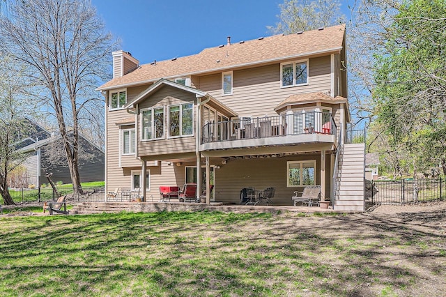 1237 Summit Oaks Dr, Burnsville, MN 55337 - rear view of house with a chimney, a patio area, a wooden deck, and stairs