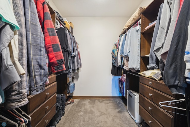 spacious closet with carpet flooring