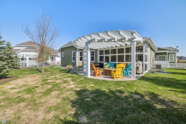 rear view of property featuring a pergola, a patio, cooling unit, and an outdoor fire pit