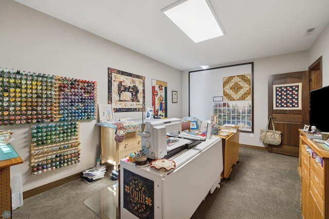 carpeted office space with baseboards
