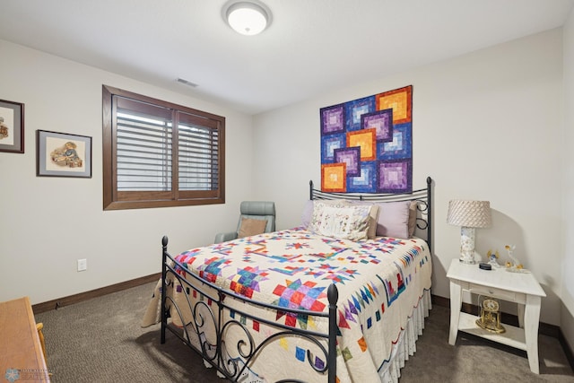 carpeted bedroom with baseboards