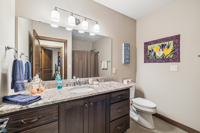 full bathroom with toilet, vanity, and a shower with shower curtain
