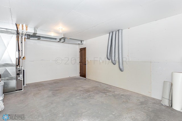 garage featuring heating unit