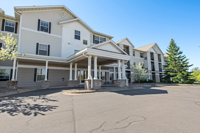 610 Whiskey Rd NW Unit 115, Isanti, MN 55040 - view of front of home with a porch