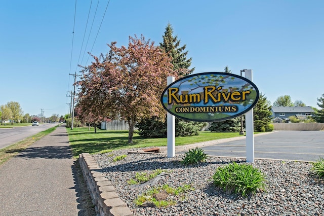 610 Whiskey Rd NW Unit 115, Isanti, MN 55040 - view of community / neighborhood sign