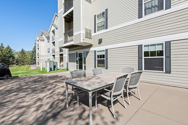 610 Whiskey Rd NW Unit 115, Isanti, MN 55040 - view of patio with outdoor dining area and grilling area
