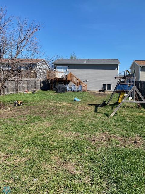 view of yard with a deck