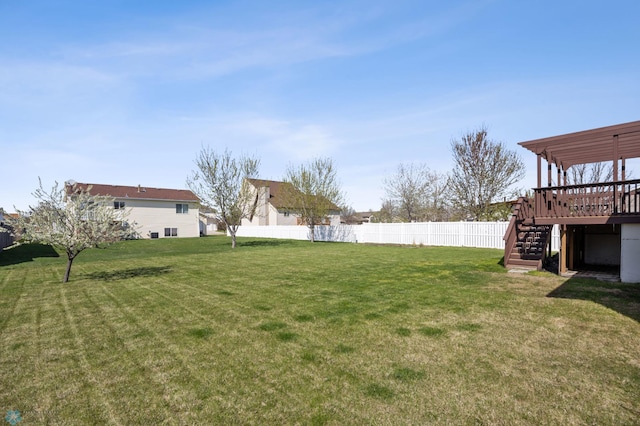 1683 Oakwood Dr, West Fargo, ND 58078 - view of yard featuring stairs and a wooden deck