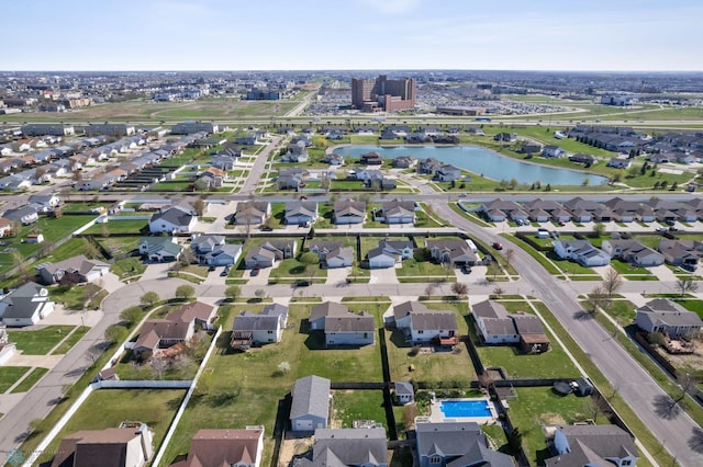 1683 Oakwood Dr, West Fargo, ND 58078 - aerial overview of property's location featuring a large body of water and nearby suburban area