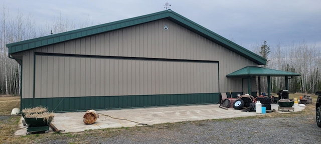 1693 Town Rd Unit 112, Birchdale, MN 56629 - view of property exterior with a pole building, an outdoor structure, and a detached garage