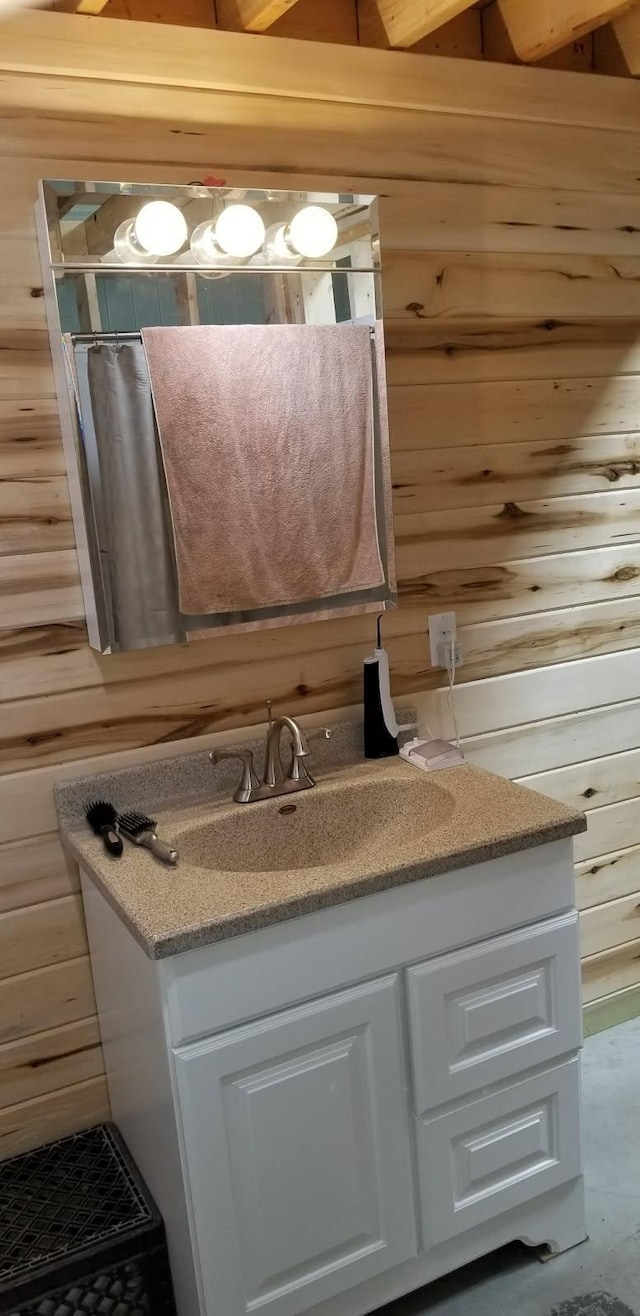 1693 Town Rd Unit 112, Birchdale, MN 56629 - bathroom featuring wooden walls and vanity