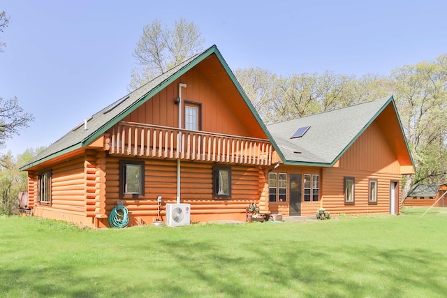 24997 145th Ave, Fort Ripley, MN 56449 - rear view of house featuring log siding, ac unit, a yard, and a shingled roof