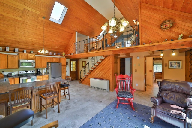 24997 145th Ave, Fort Ripley, MN 56449 - living room with a chandelier, high vaulted ceiling, a skylight, stairs, and wood ceiling