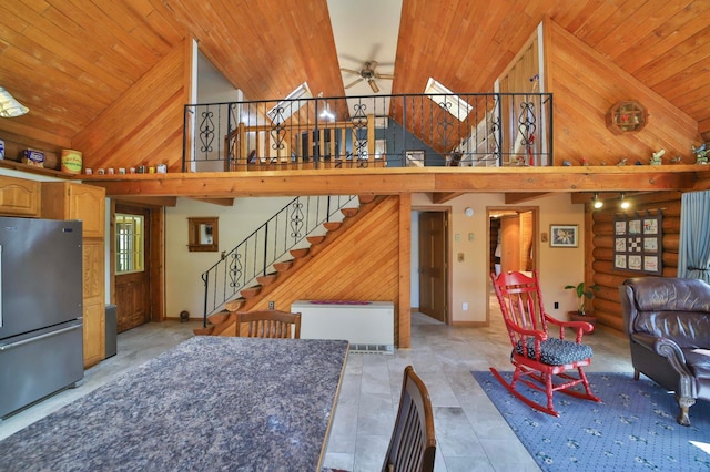 24997 145th Ave, Fort Ripley, MN 56449 - living area featuring high vaulted ceiling, ceiling fan, wooden ceiling, and stairs