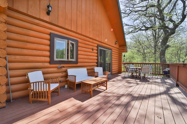 24997 145th Ave, Fort Ripley, MN 56449 - wooden terrace featuring outdoor dining area